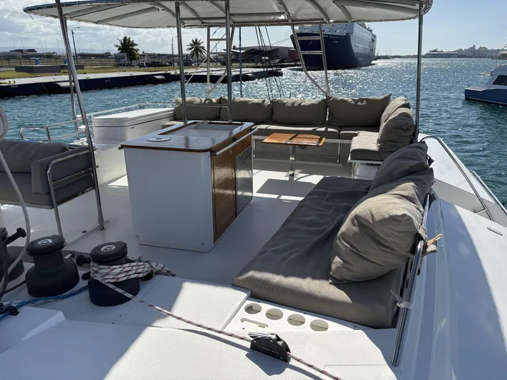 Adventure For Seven Yacht Photos Pics 2017 Fountaine Pajot Ipanema 58 yacht deck with seating and ocean view.