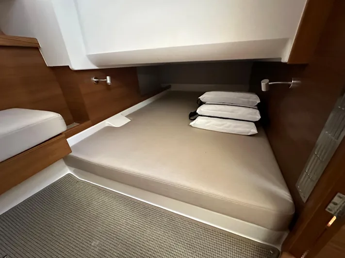 Mdr Yacht Photos Pics Nimbus T11 2021 boat interior cabin with bed and pillows.