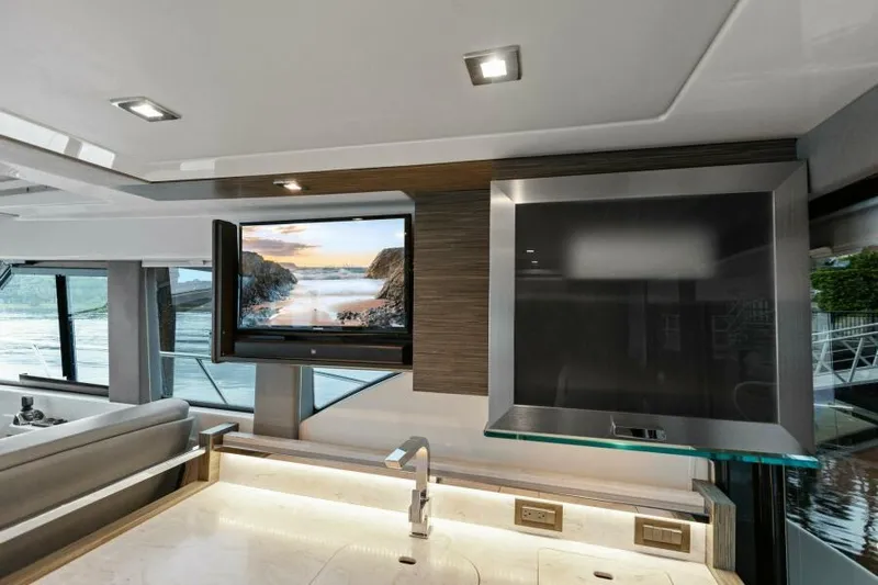 Big Eyes Yacht Photos Pics Interior of 2019 Tiara Yachts 39 Coupe with modern kitchen and scenic view.