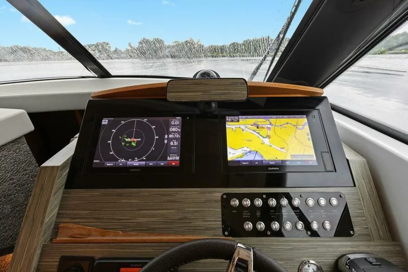 Big Eyes Yacht Photos Pics 2019 Tiara Yachts 39 Coupe helm with navigation screens and controls.