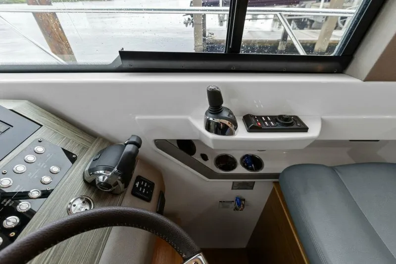 Big Eyes Yacht Photos Pics 2019 Tiara Yachts 39 Coupe helm controls and dashboard interior.