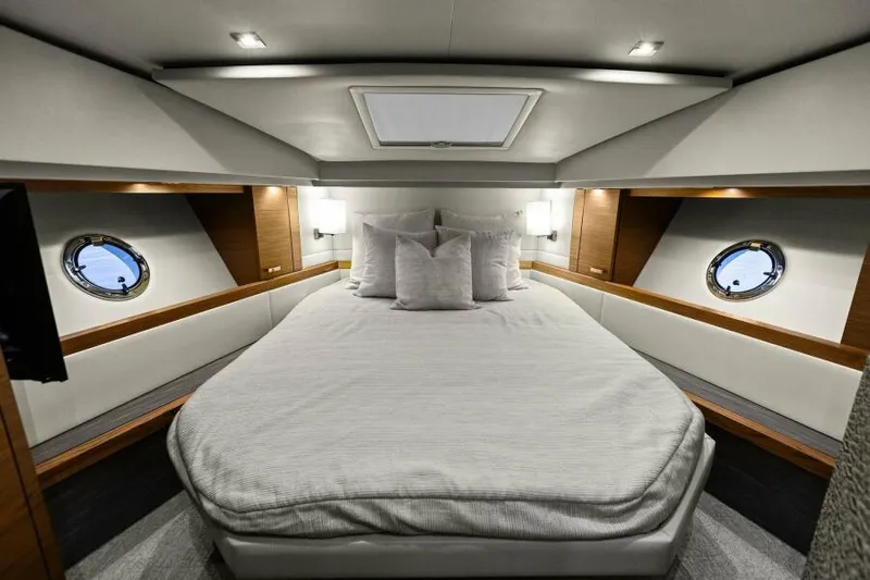 Big Eyes Yacht Photos Pics Luxurious bedroom interior of 2019 Tiara Yachts 39 Coupe with elegant design.