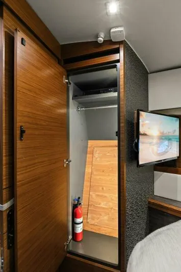 Big Eyes Yacht Photos Pics Interior of 2019 Tiara Yachts 39 Coupe with closet and TV.