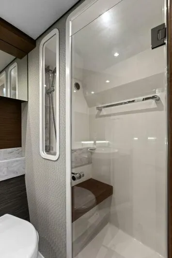 Big Eyes Yacht Photos Pics 2019 Tiara Yachts 39 Coupe bathroom with modern shower and sleek design.