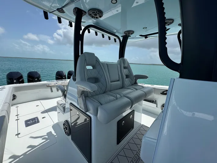  Yacht Photos Pics Luxury interior of 2025 Freeman 38 boat with plush seating and ocean view.
