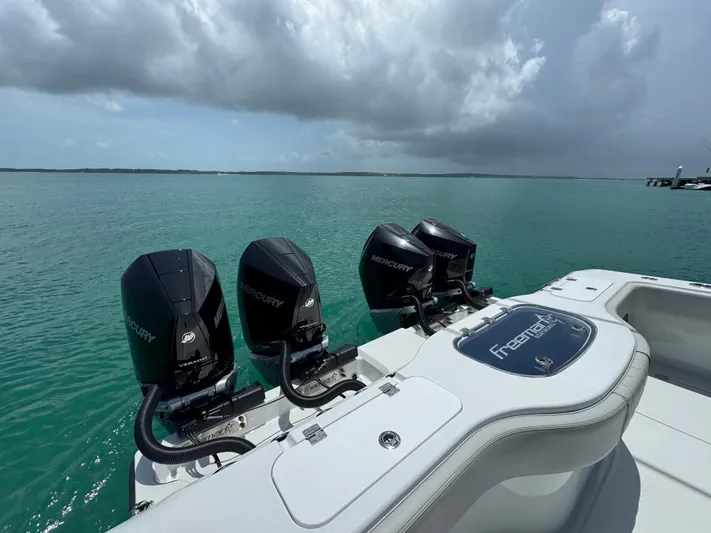  Yacht Photos Pics Freeman 38 boat with Mercury engines on a calm sea, 2025 model.