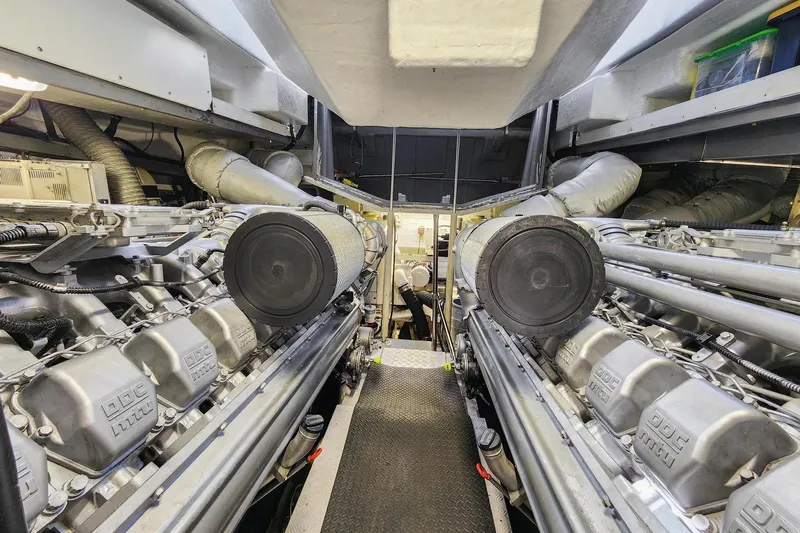 Alchemy Yacht Photos Pics Engine room of 2003 Baia PANTHER 80 yacht, featuring dual MTU engines.