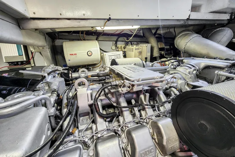 Alchemy Yacht Photos Pics Engine room of 2003 Baia PANTHER 80 yacht, showcasing complex machinery and components.