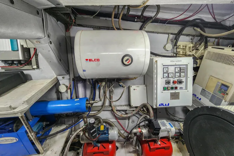 Alchemy Yacht Photos Pics Engine room of a 2003 Baia PANTHER 80 yacht with Elco equipment and Atlas system controls.