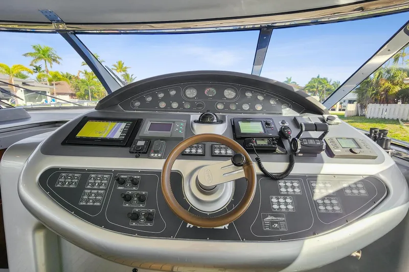 Alchemy Yacht Photos Pics Cockpit of 2003 Baia PANTHER 80 yacht with advanced navigation controls.