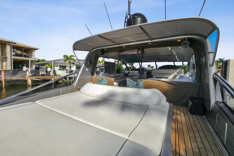 Alchemy Yacht Photos Pics Luxurious 2003 Baia PANTHER 80 yacht with spacious deck and elegant interior design.