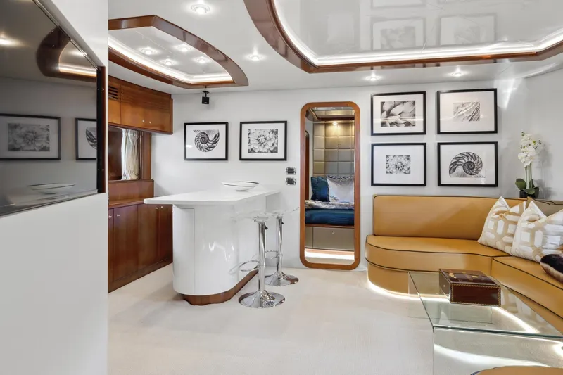Alchemy Yacht Photos Pics Luxurious interior of 2003 Baia PANTHER 80 yacht with modern decor and elegant furnishings.