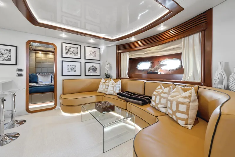 Alchemy Yacht Photos Pics Luxurious interior of 2003 Baia PANTHER 80 yacht with elegant seating and modern decor.