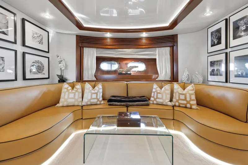 Alchemy Yacht Photos Pics Luxurious interior of 2003 Baia PANTHER 80 yacht with elegant seating and decor.