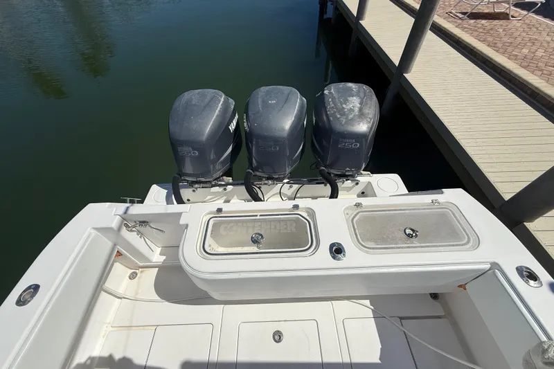  Yacht Photos Pics 2008 Contender 33 Tournament boat with triple Yamaha 250 engines at dock.