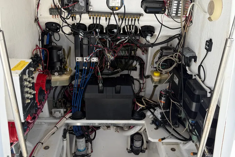  Yacht Photos Pics Electrical system of a 2008 Contender 33 Tournament boat, showcasing wiring and components.