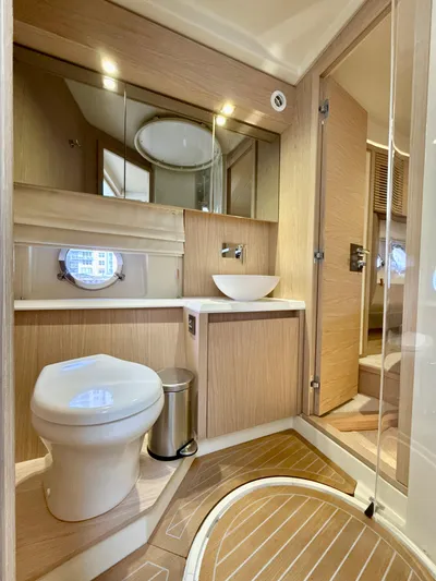  Yacht Photos Pics Luxurious bathroom in 2017 Beneteau Monte Carlo 5S yacht with modern fixtures.