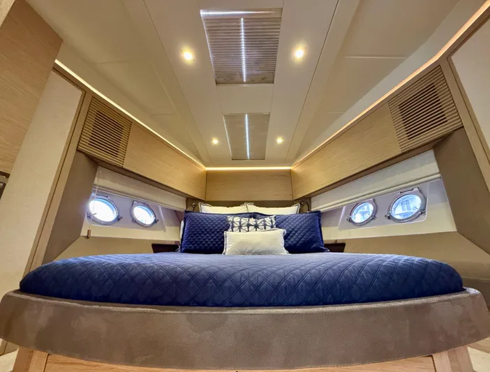  Yacht Photos Pics Luxurious cabin interior of 2017 Beneteau Monte Carlo 5S yacht with elegant bedding.