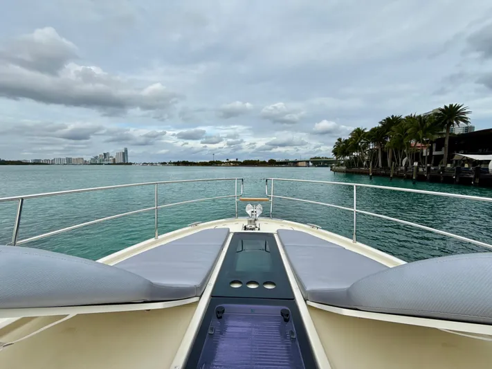  Yacht Photos Pics Bow view of 2017 Beneteau Monte Carlo 5S yacht on calm waters.