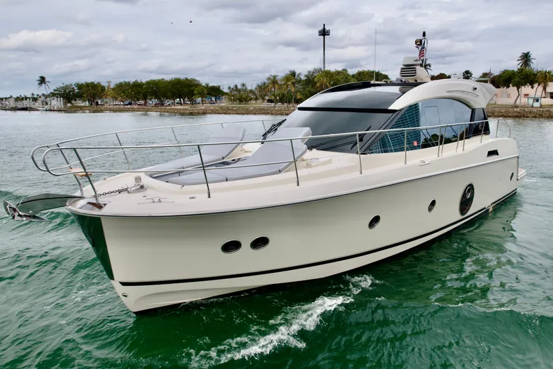  Yacht Photos Pics 2017 Beneteau Monte Carlo 5S yacht cruising on calm waters.