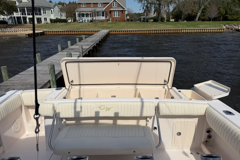  Yacht Photos Pics 2008 Grady-White Canyon 336 boat docked by waterfront homes.