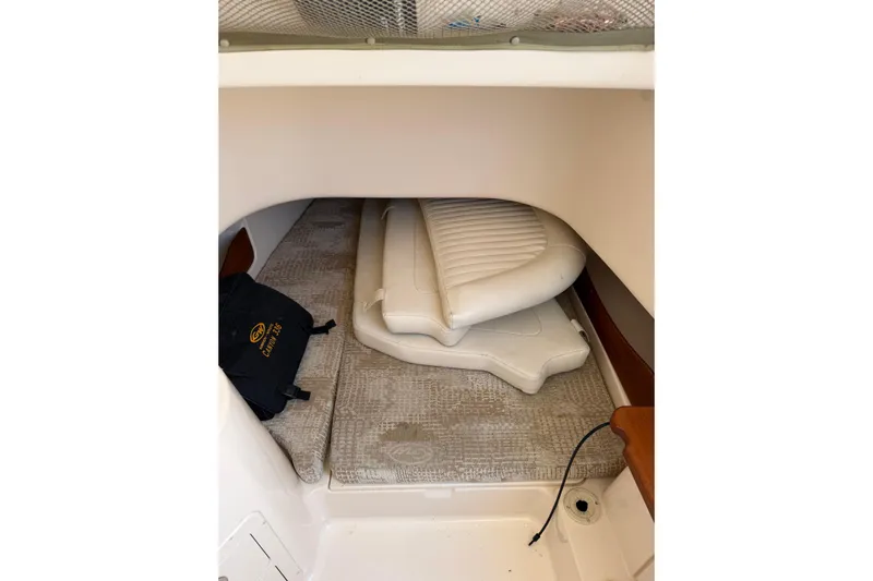  Yacht Photos Pics 2008 Grady-White Canyon 336 cabin interior with cushions and storage.