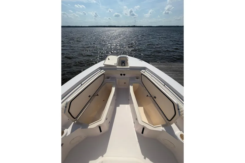  Yacht Photos Pics 2008 Grady-White Canyon 336 boat interior with open storage, overlooking calm waters.
