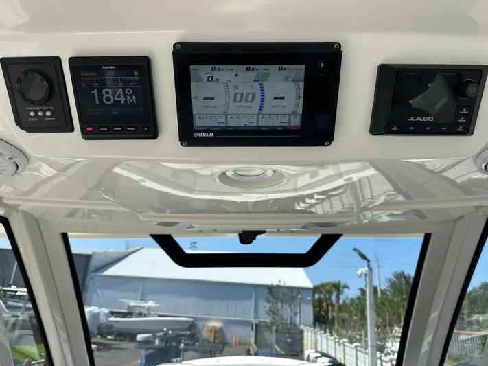 Yacht Photos Pics 2020 Pursuit S368 boat dashboard with navigation and control displays.