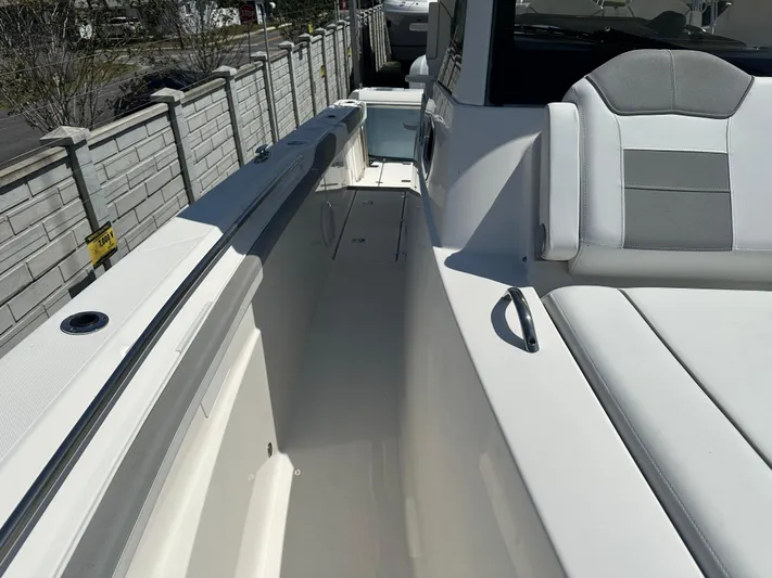  Yacht Photos Pics 2020 Pursuit S368 boat interior with sleek seating and modern design.