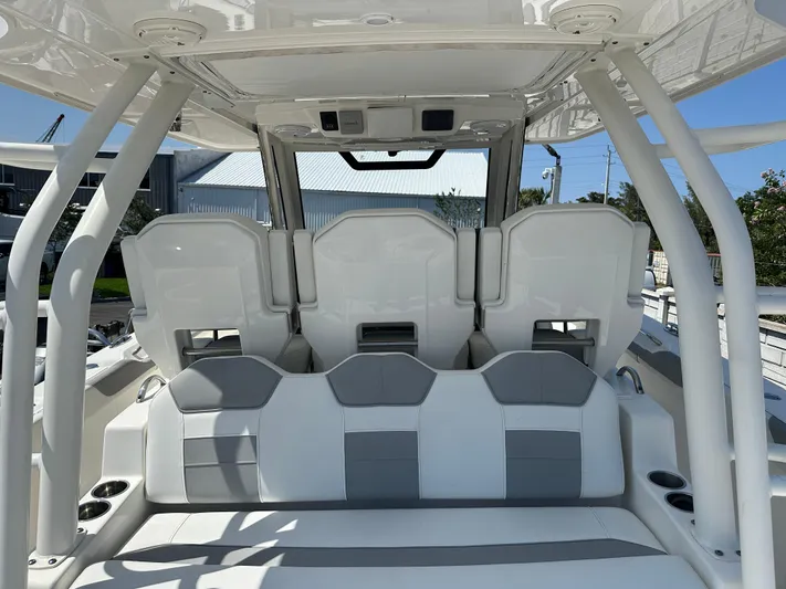  Yacht Photos Pics 2020 Pursuit S368 boat interior with white and gray seating arrangement.