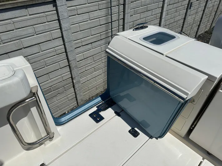  Yacht Photos Pics 2020 Pursuit S368 boat interior with storage compartment and sleek design.