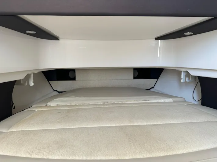  Yacht Photos Pics Interior cabin of 2020 Pursuit S368 boat with cushioned seating and modern design.