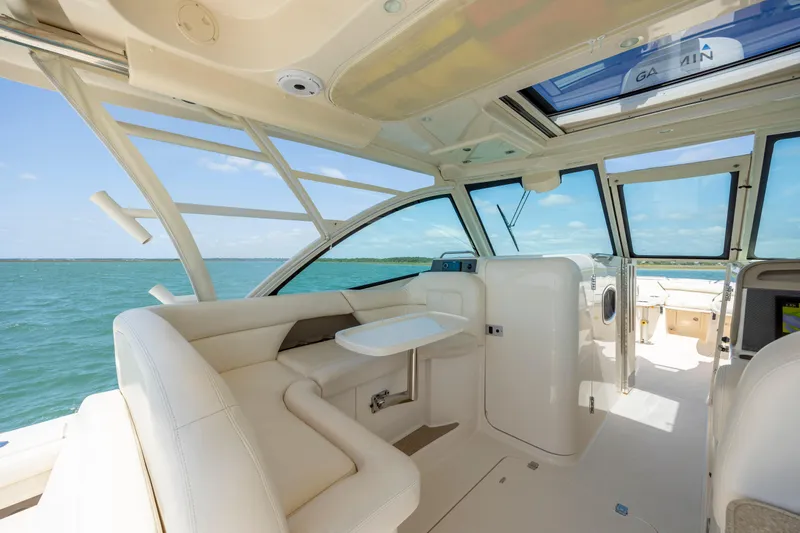  Yacht Photos Pics 2015 Grady-White Freedom 375 boat interior with seating and ocean view.