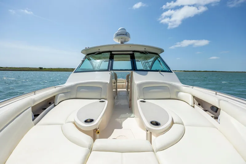  Yacht Photos Pics 2015 Grady-White Freedom 375 boat with spacious seating on open water.