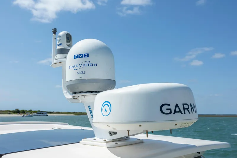  Yacht Photos Pics Grady-White Freedom 375 (2015) with Garmin and TracVision equipment on a sunny day.