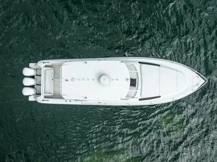  Yacht Photos Pics Overhead view of 2015 Intrepid 400 Cuddy boat on water.