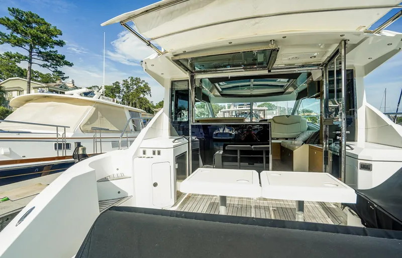  Yacht Photos Pics 2016 Cruisers Yachts 45 Cantius luxury yacht interior with open deck and seating area.