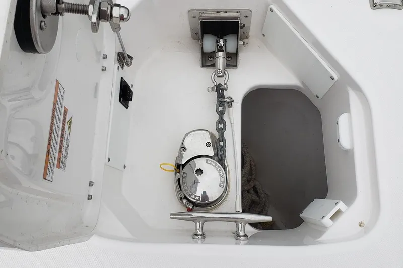  Yacht Photos Pics Anchor compartment of 2023 Everglades 285CC boat with chain and cleat.
