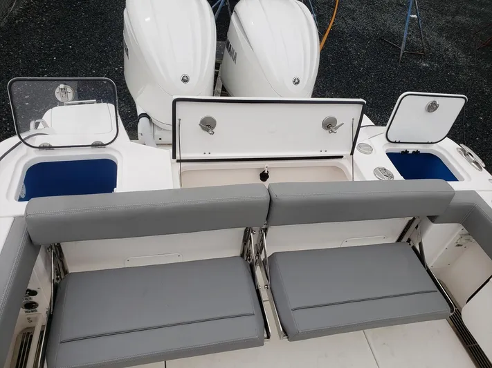  Yacht Photos Pics 2023 Everglades 285CC boat with dual engines and gray seating.