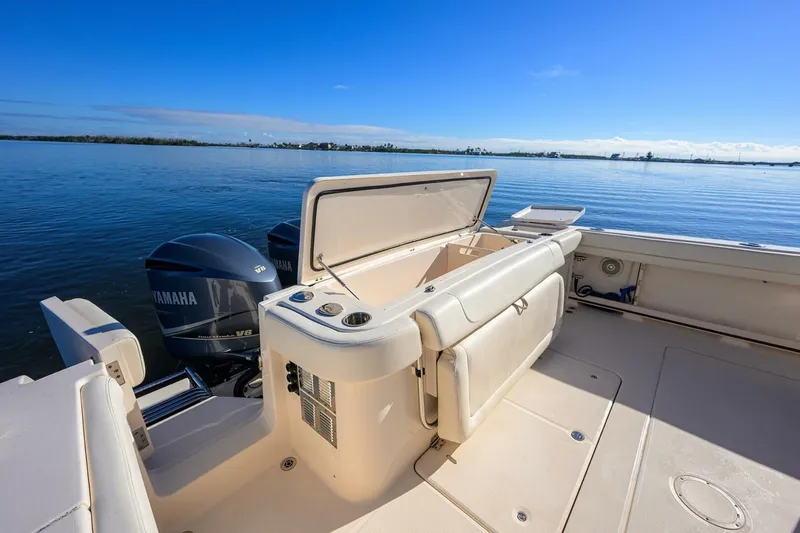  Yacht Photos Pics 2018 Grady-White Canyon 376 boat with Yamaha engines on calm water.