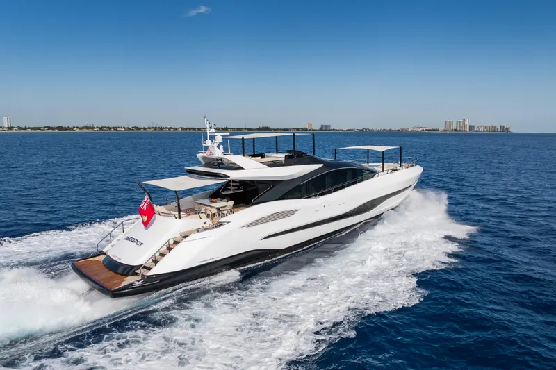  Yacht Photos Pics Luxury 2023 Mangusta 104 REV yacht cruising on open sea.