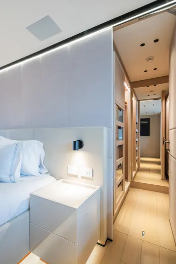  Yacht Photos Pics Luxurious interior of 2023 Mangusta 104 REV yacht bedroom with modern design.