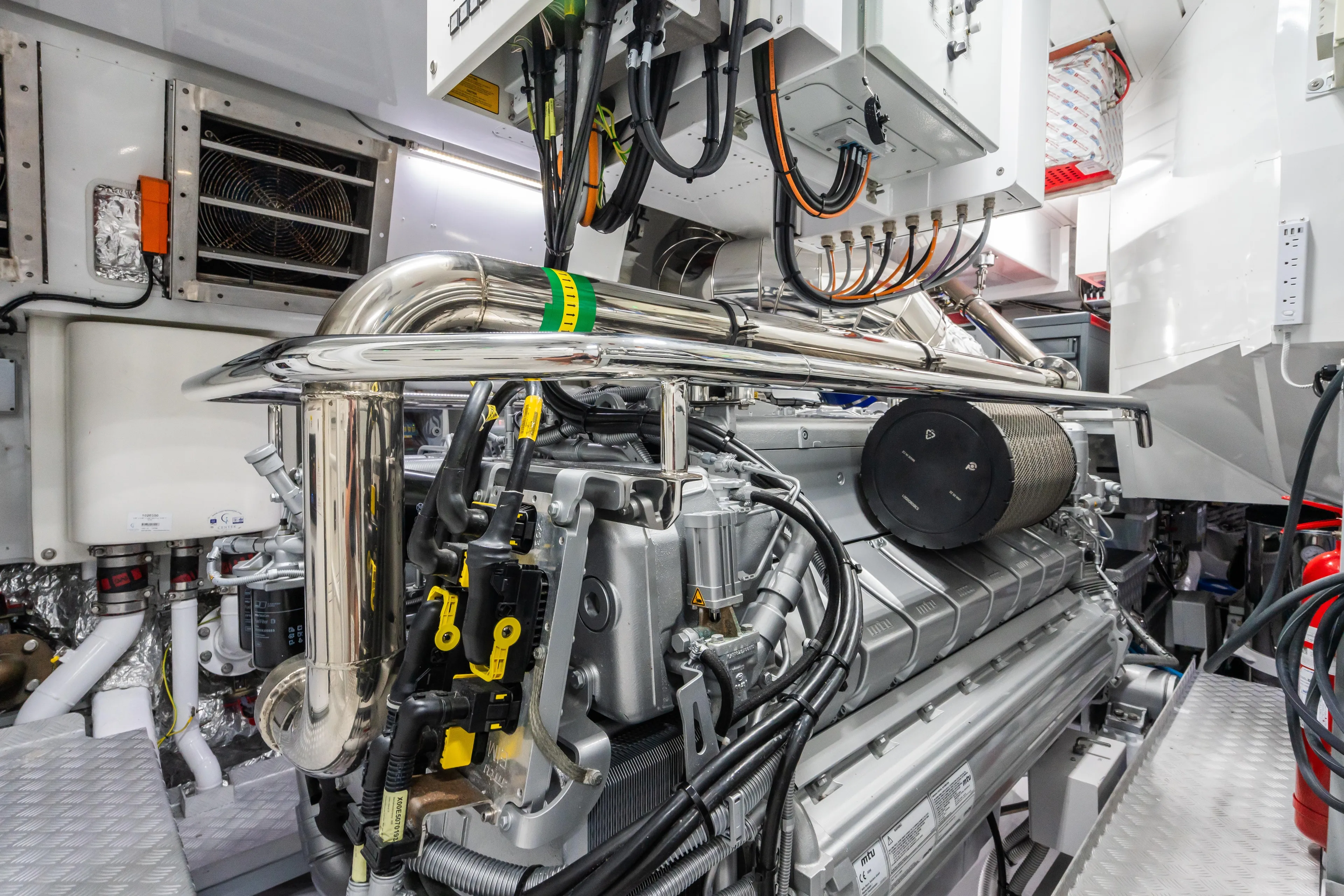  Yacht Photos Pics Engine room of 2023 Mangusta 104 REV yacht, showcasing advanced machinery and components.