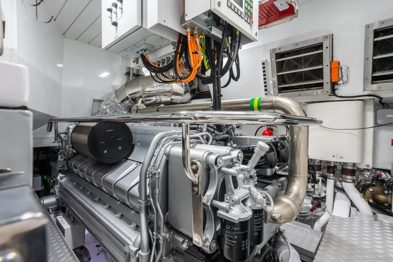  Yacht Photos Pics Engine room of 2023 Mangusta 104 REV yacht, showcasing advanced machinery and components.