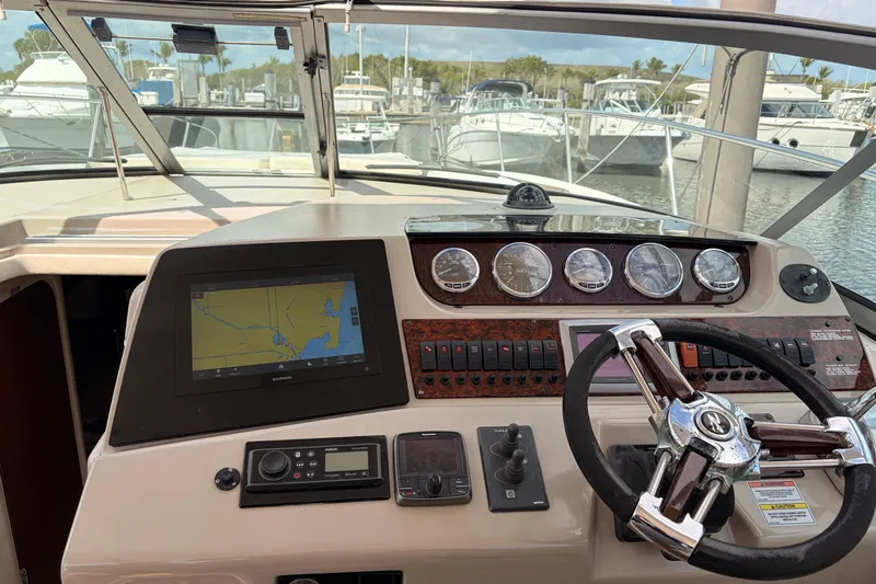  Yacht Photos Pics Cockpit of 2008 Sea Ray Sundancer 350 with navigation system and steering wheel.