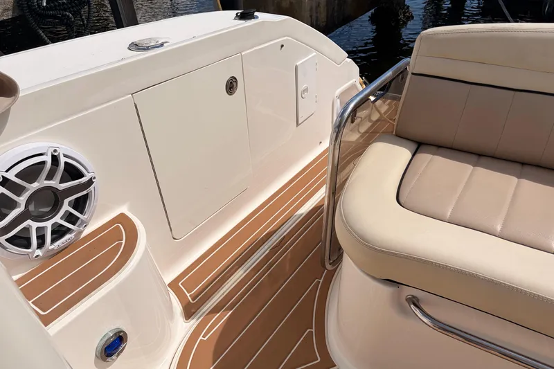  Yacht Photos Pics 2008 Sea Ray Sundancer 350 boat interior with beige seating and marine speaker.