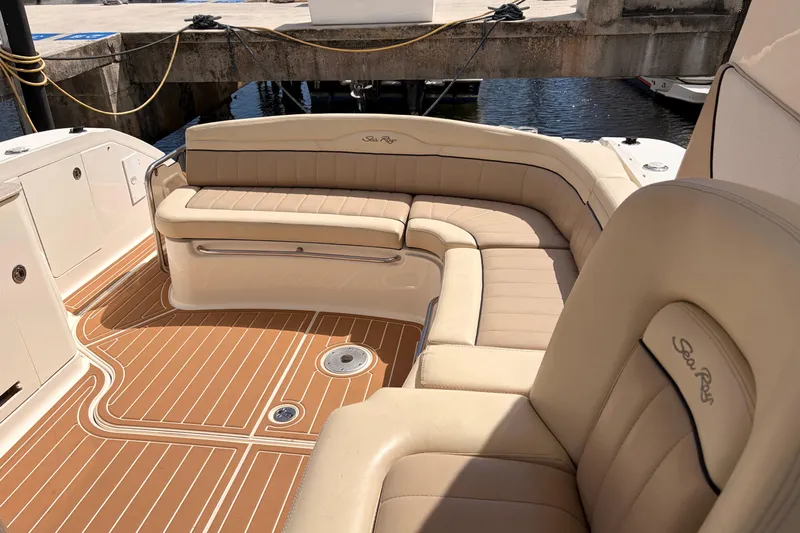 Yacht Photos Pics Luxurious seating on a 2008 Sea Ray Sundancer 350 yacht with elegant tan upholstery.