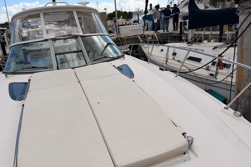  Yacht Photos Pics 2008 Sea Ray Sundancer 350 yacht docked at marina with other boats.