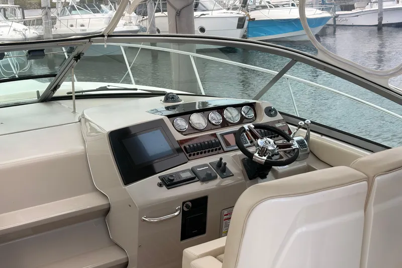  Yacht Photos Pics Helm of 2008 Sea Ray Sundancer 350 with modern controls and gauges.
