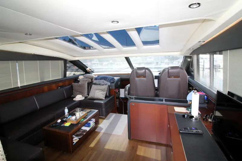  Yacht Photos Pics Luxurious interior of 2013 Princess V62 yacht with leather seating and modern amenities.